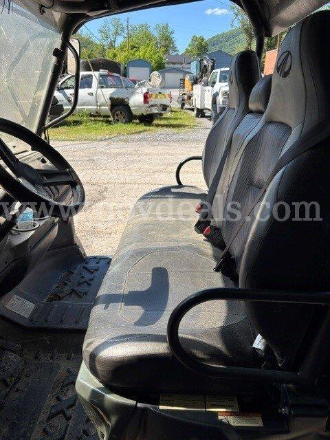 Mahindra Retriever 1000 UTV 4X4 With dump bed. Runs and drives. Has a winch mounted on the front.