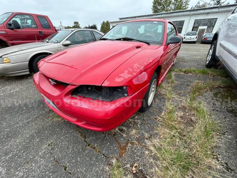 Red 1997 Ford Mustang Coupe
