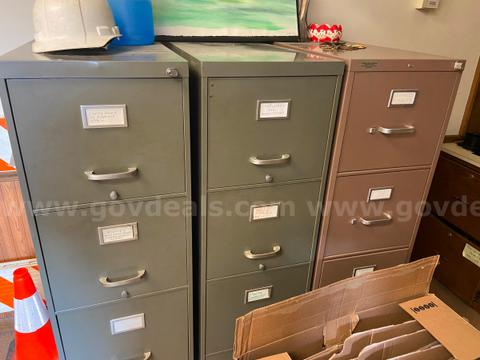 9 steel filing cabinets