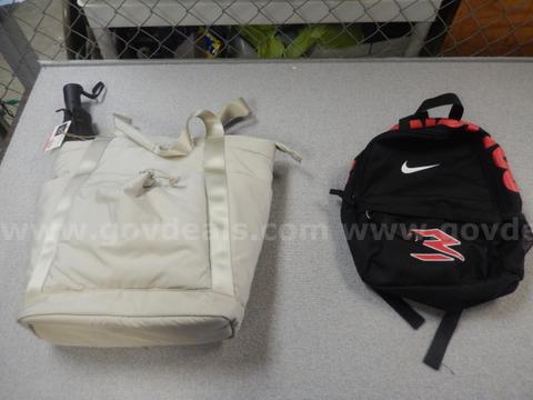 USED (1) NIKE SMALL BACKPACK, (1) BLACK UMBRELLA, (1) LIFE STYLE, BEIGE, SPORT TOTE, (1) PAIR WHITE, CRANE LADIES SHOES
