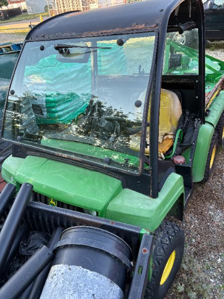 (2) JOHN DEERE GATORS