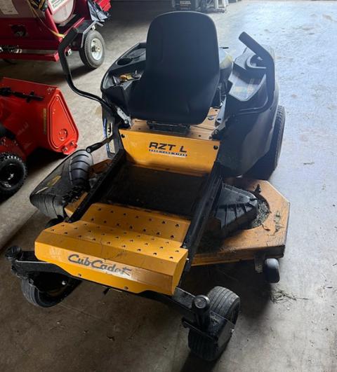 2000 Cub Cadet RZT Zero Turn Mower and Husqvarna push mower