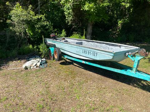 River Rat Jon Boat and Trailer with a 2002 15 HP Mercury Motor
