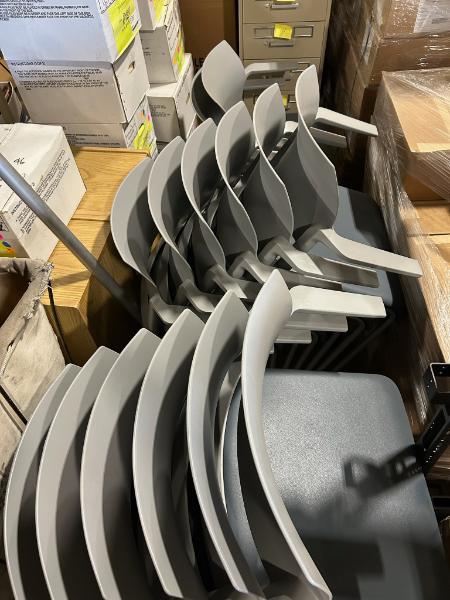 Fourteen Basic Plastic Chairs