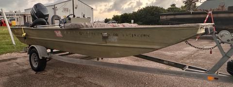 Boat With Outboard Engine and Trailer