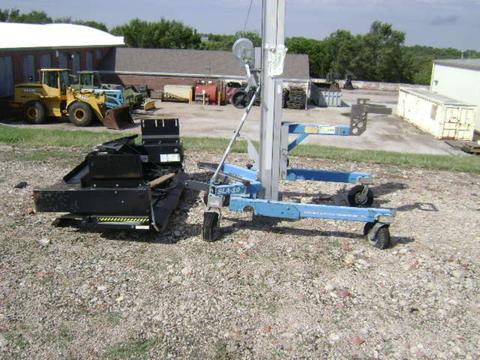 (1) Tommy Tailgate Lift and (1) Genie SLA-10 Lift
