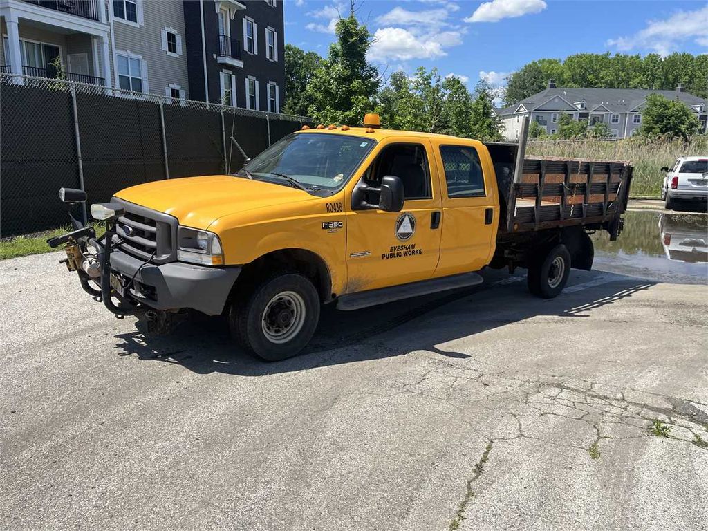 2004 F350 Stake Body Truck - photo 1