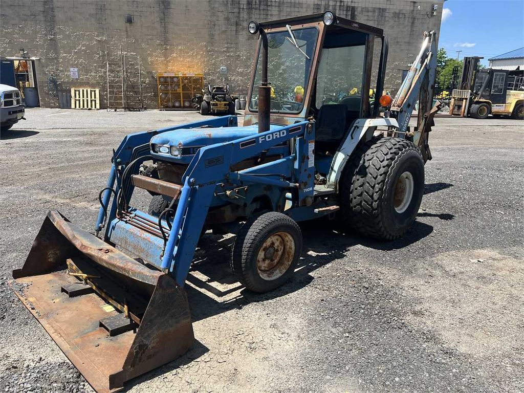 Ford Tractor with Front and Rear Attachments - photo 1
