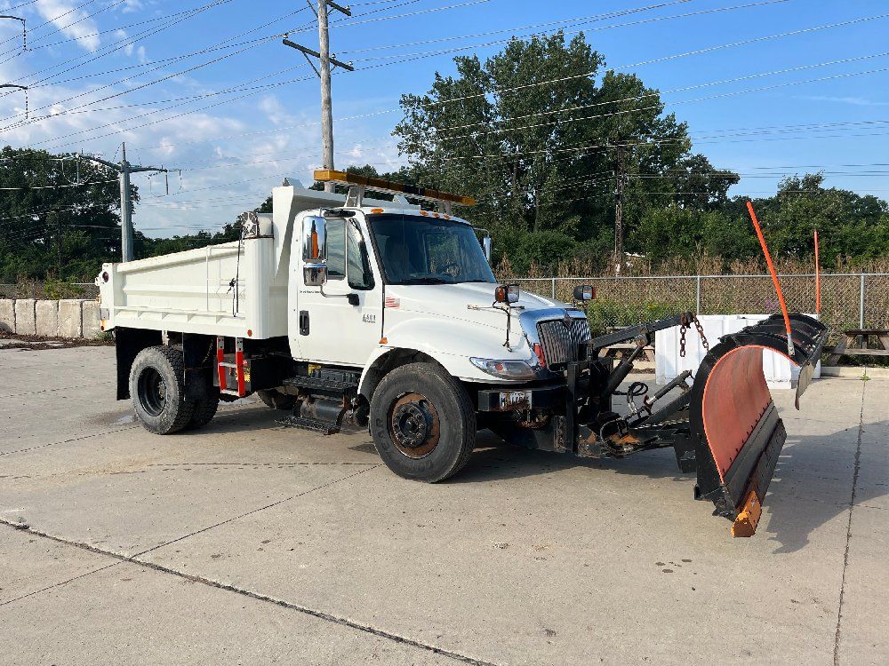 2003 International 4400 Slope Side Dump With a Plow 2 of 2 - photo 1