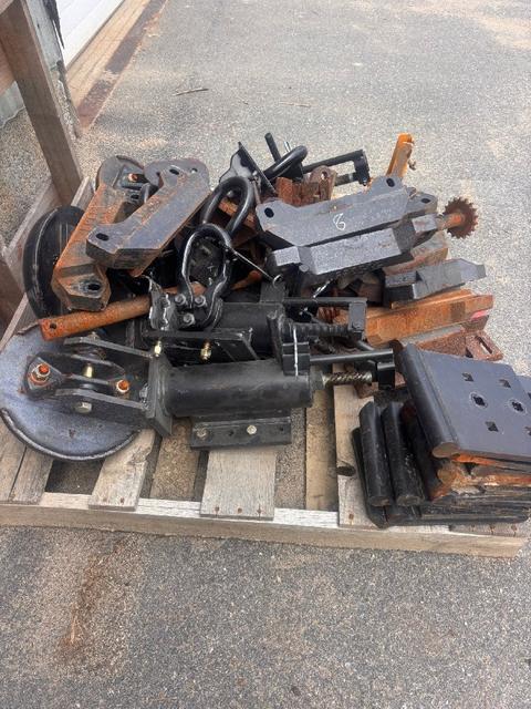 Pallet of new and used plow parts
