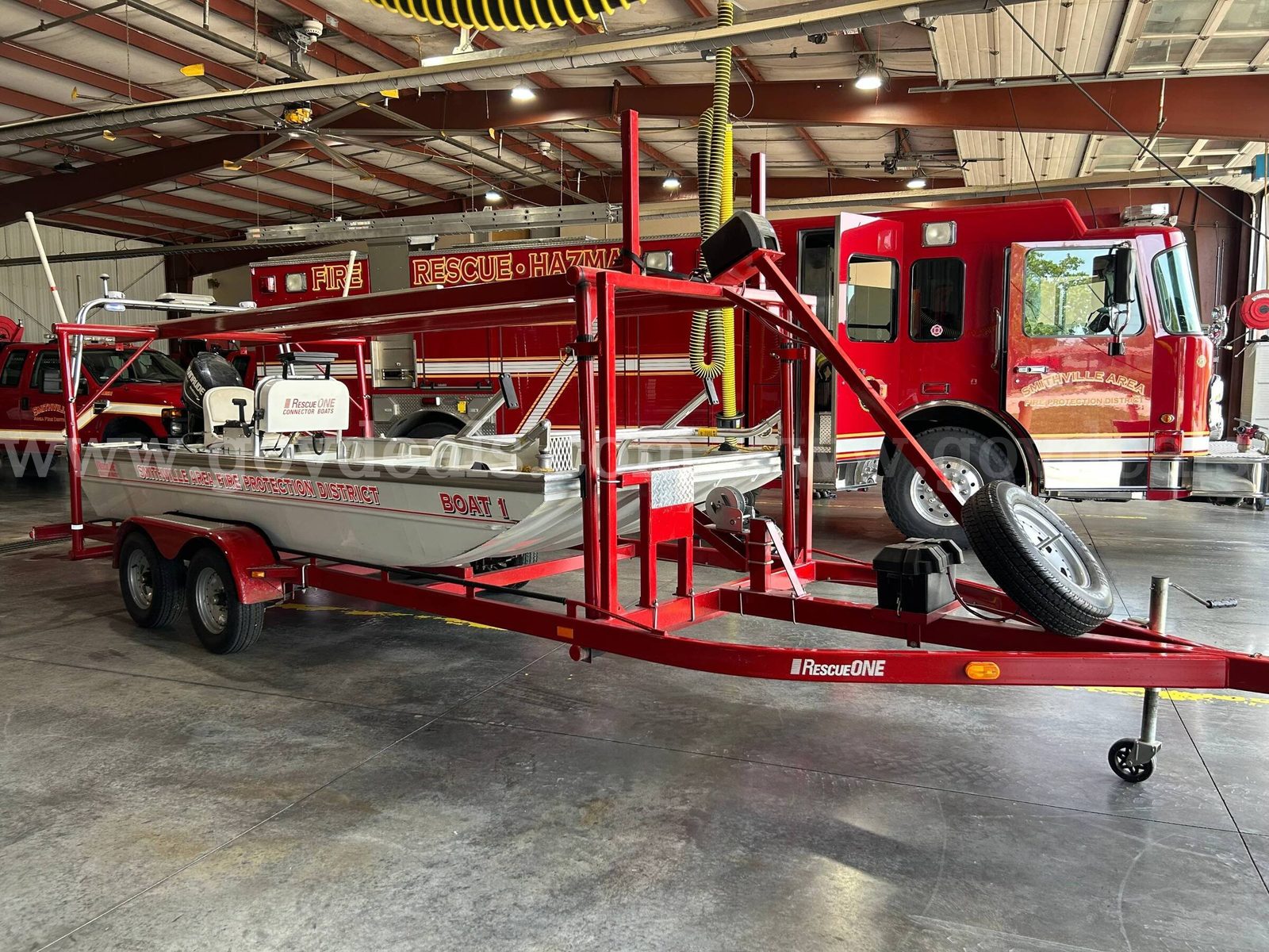 16 foot rescue boat with dive/rescue platform; includes fire pump and double dec, a US government surplus lot with no bids, in Smithville, MO