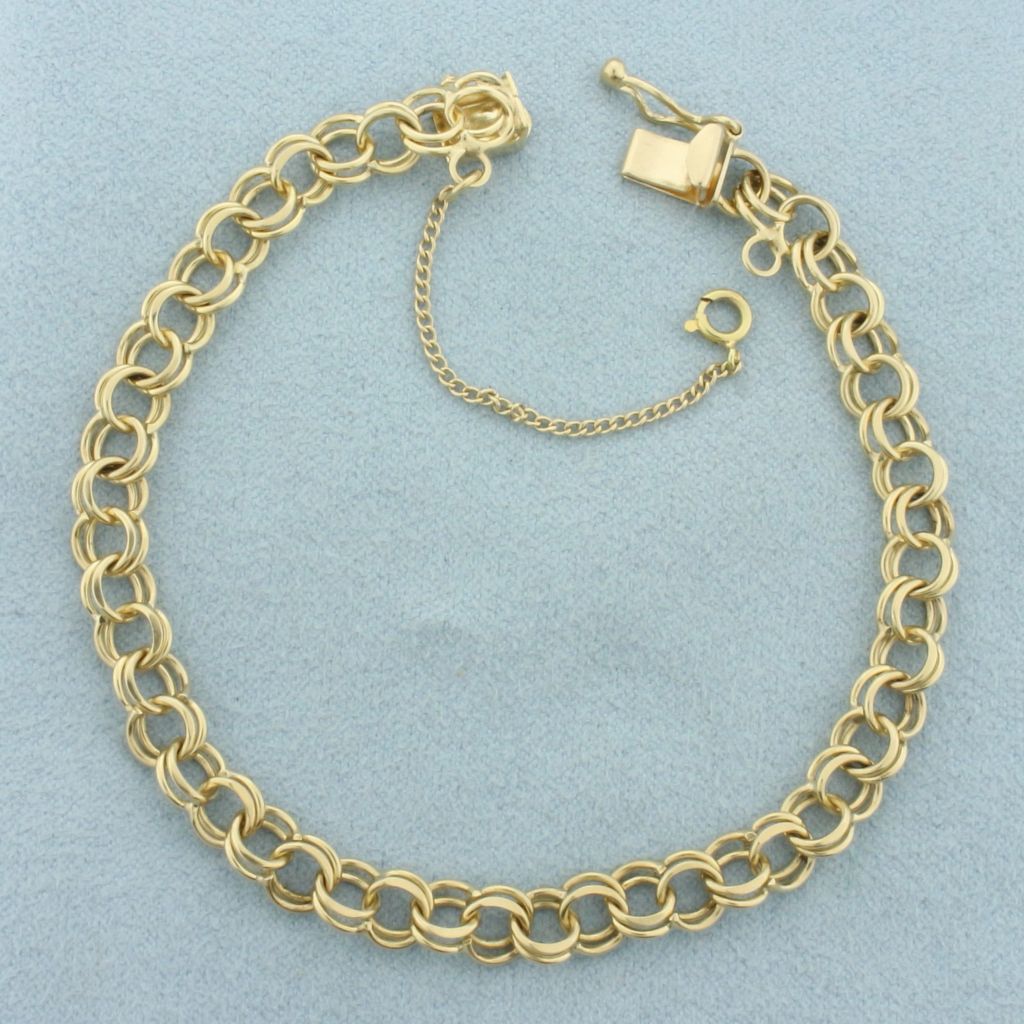 Double Ring Charm Bracelet in 14k Yellow Gold - photo 1