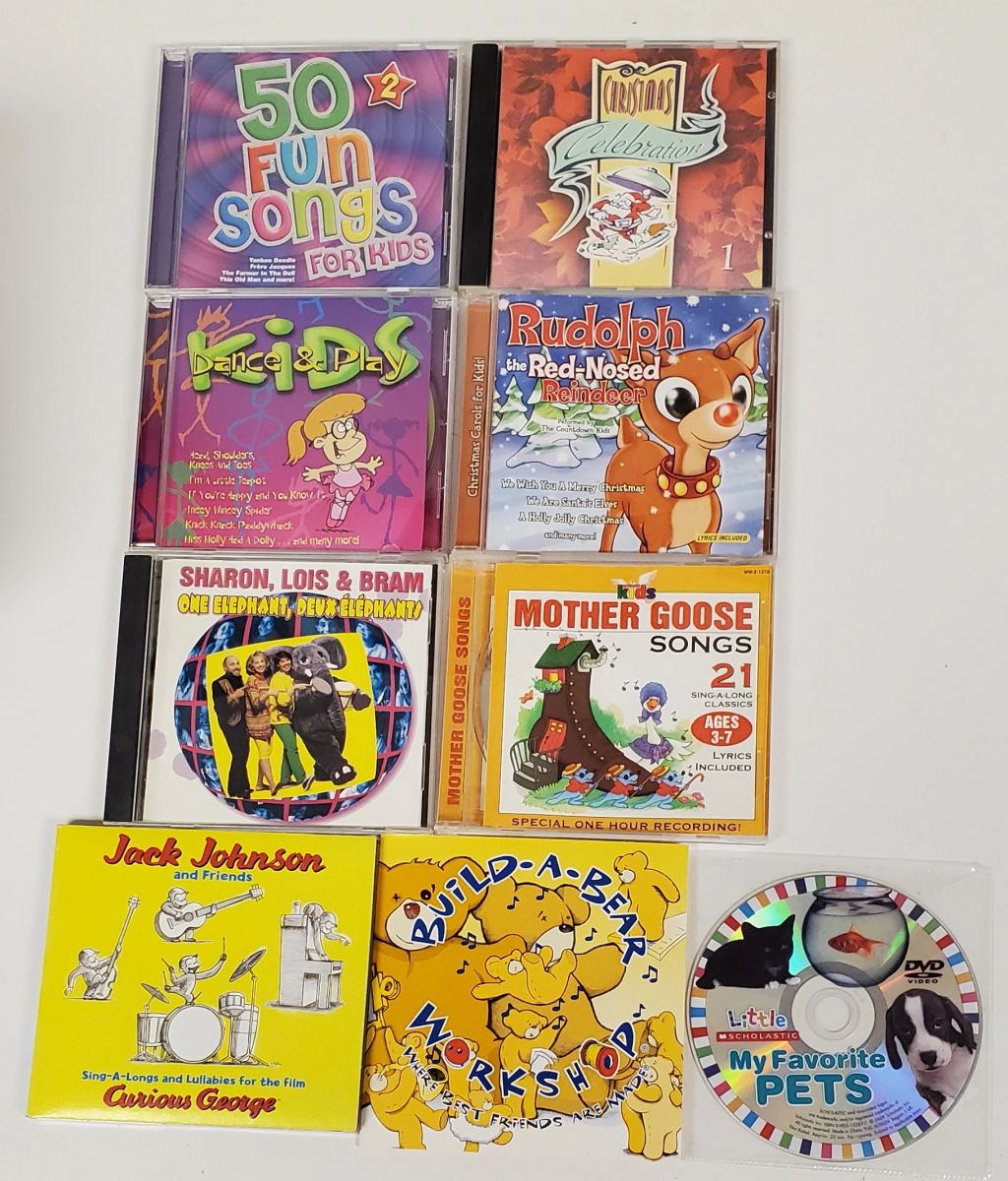 Assorted Kids Music & DVD Lot – 9 Discs incl. Jack Johnson, Mother Goose, Rudolph, Build-A-Bear - photo 1
