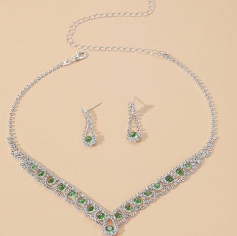 36.50ctw Peridot & CZ 18k Gold Overlay Necklace & Earrings Set