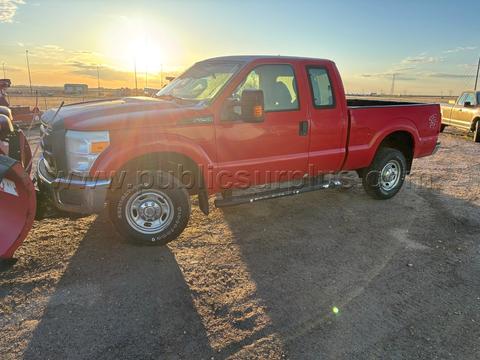 2014 Ford F-250 with a V-blade snow plow