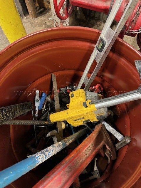 Drum with assorted tools — photo 1