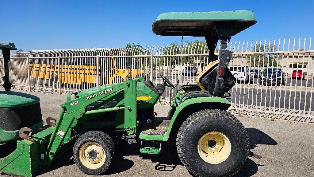 2010 John Deere 420 Tractor W/Attachments — photo 1