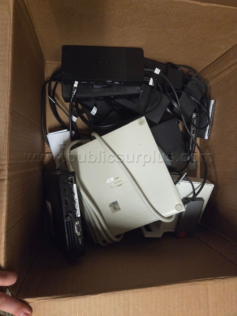 Box of Miscellaneous Laptop Docking Stations and Related Accessories. — photo 1