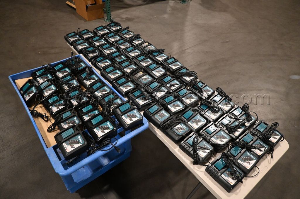 Lot of 60 Makita Battery Chargers — photo 1