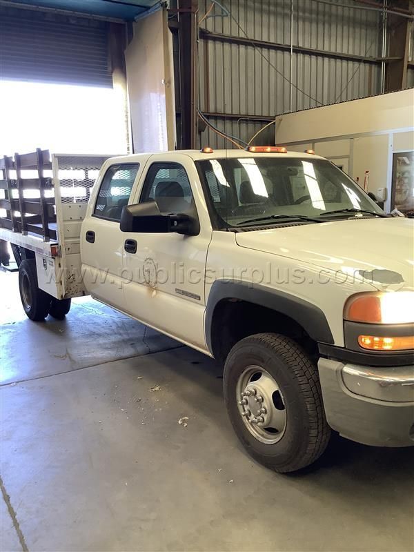 2007 GMC 3500 Stake Bed — photo 1