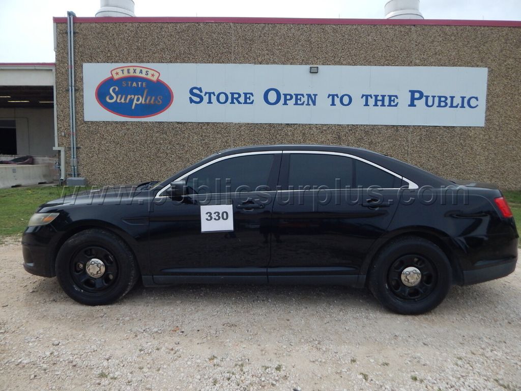 Lot 330 - 2015 Ford Taurus - 1FAHP2MK2FG173188 — photo 1