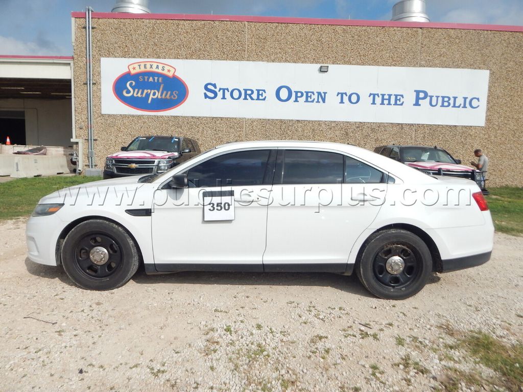 Lot 350 - 2016 Ford Taurus - 1FAHP2MK9GG144885 — photo 1