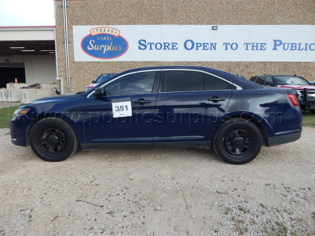 Lot 351 - 2016 Ford Taurus - 1FAHP2MKXGG143812 — photo 1