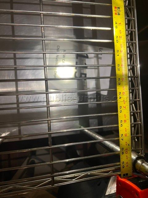 Lot # 115 Metal table with shelves — photo 1