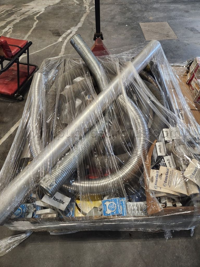 Bin of Exhaust Parts — photo 1