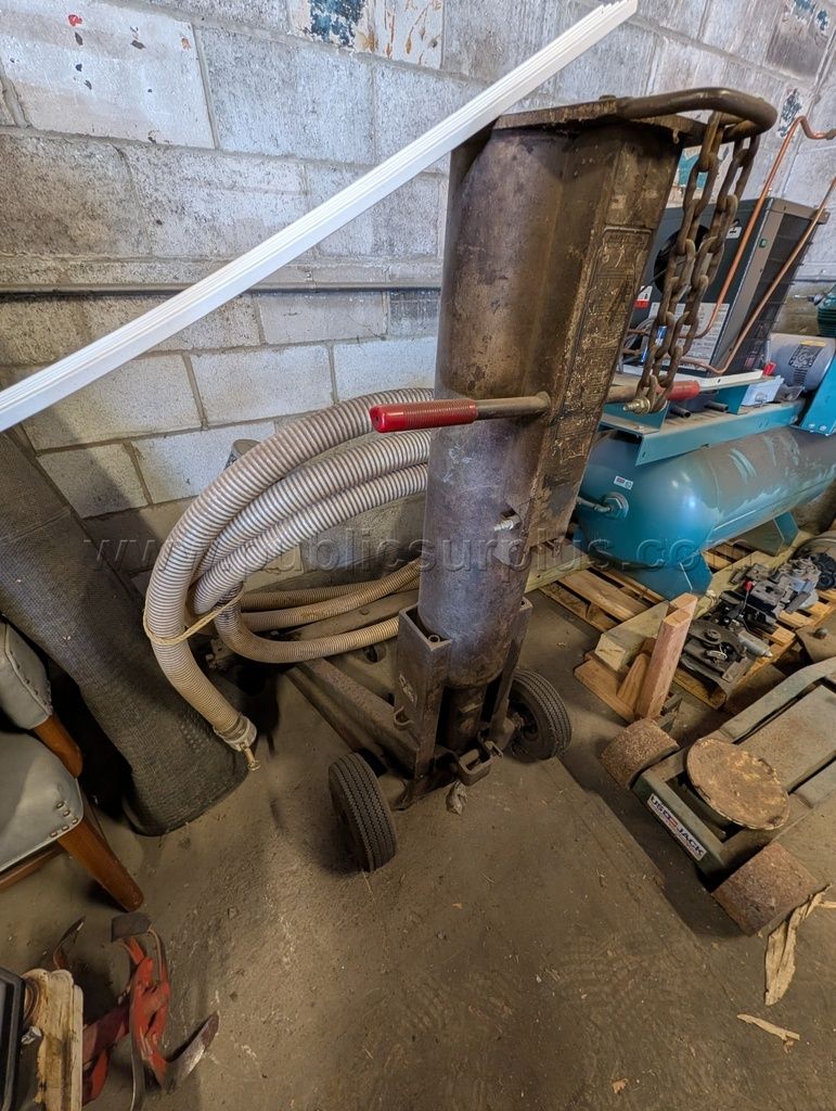 Gray Porta-Matic air lift jack — photo 1