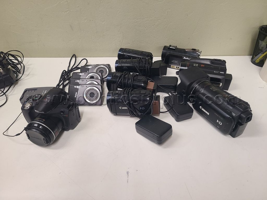 Camcorders and Cameras - photo 1