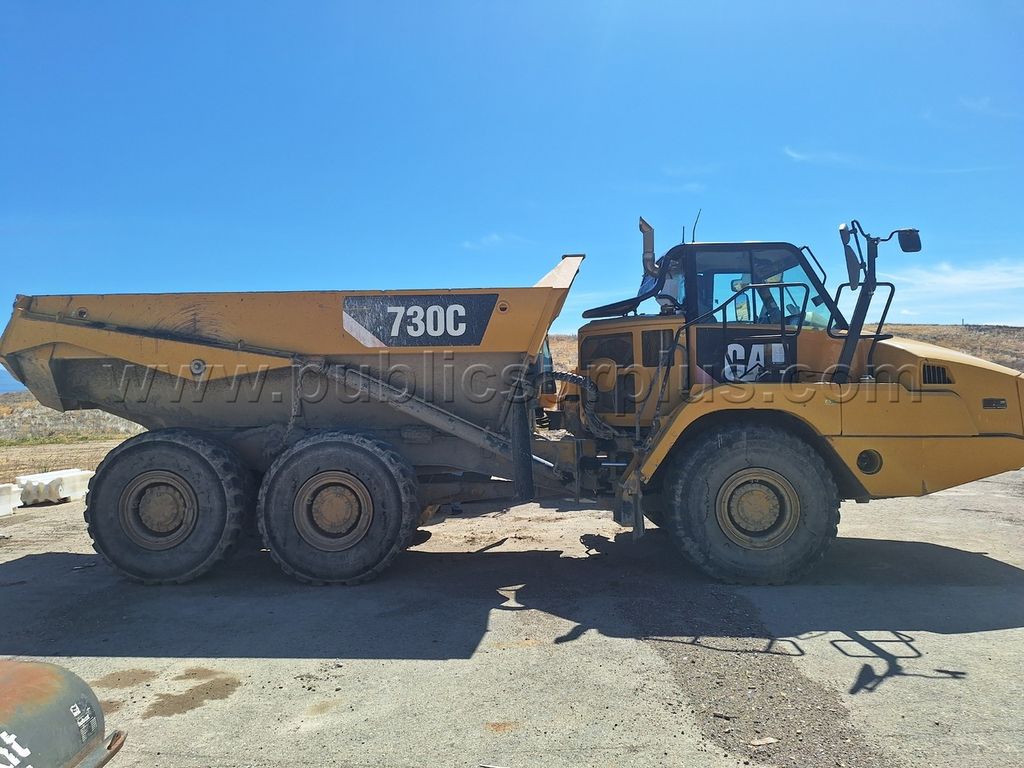 CAT 730C Articulated Haul Truck / Dump Truck — photo 1