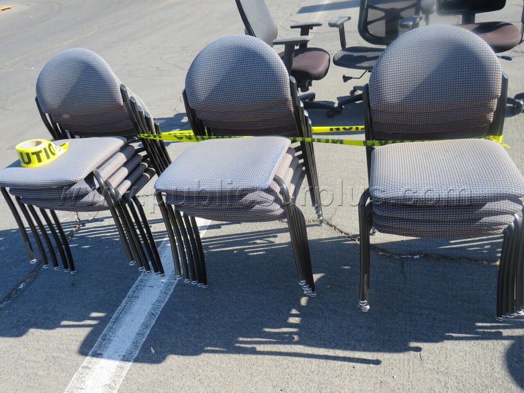 Lot of Stacking Chairs — photo 1