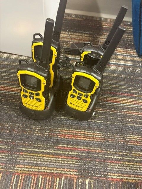 4 Motorola Two Way Radios with stands — photo 1