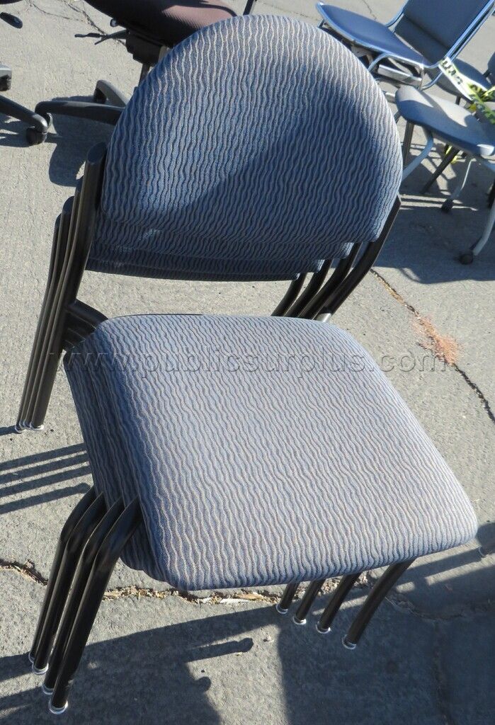 Lot of 4 Stacking Chairs — photo 1