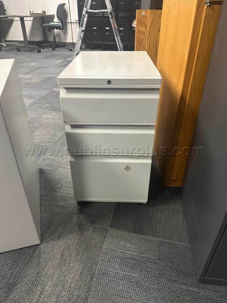 Item #10 - Small Filing Cabinet w/ Drawers — photo 1