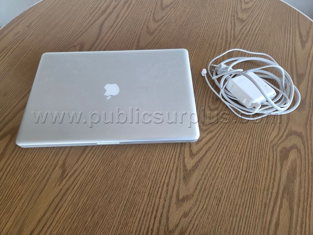 (1) MacBook Pro and Power Cable - photo 1