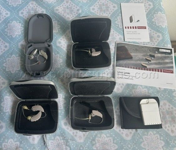HEARING AIDS - 4 RESOUND - 2 PAIR AND 2 INDIVUDAL AIDES WITH CASE - photo 1