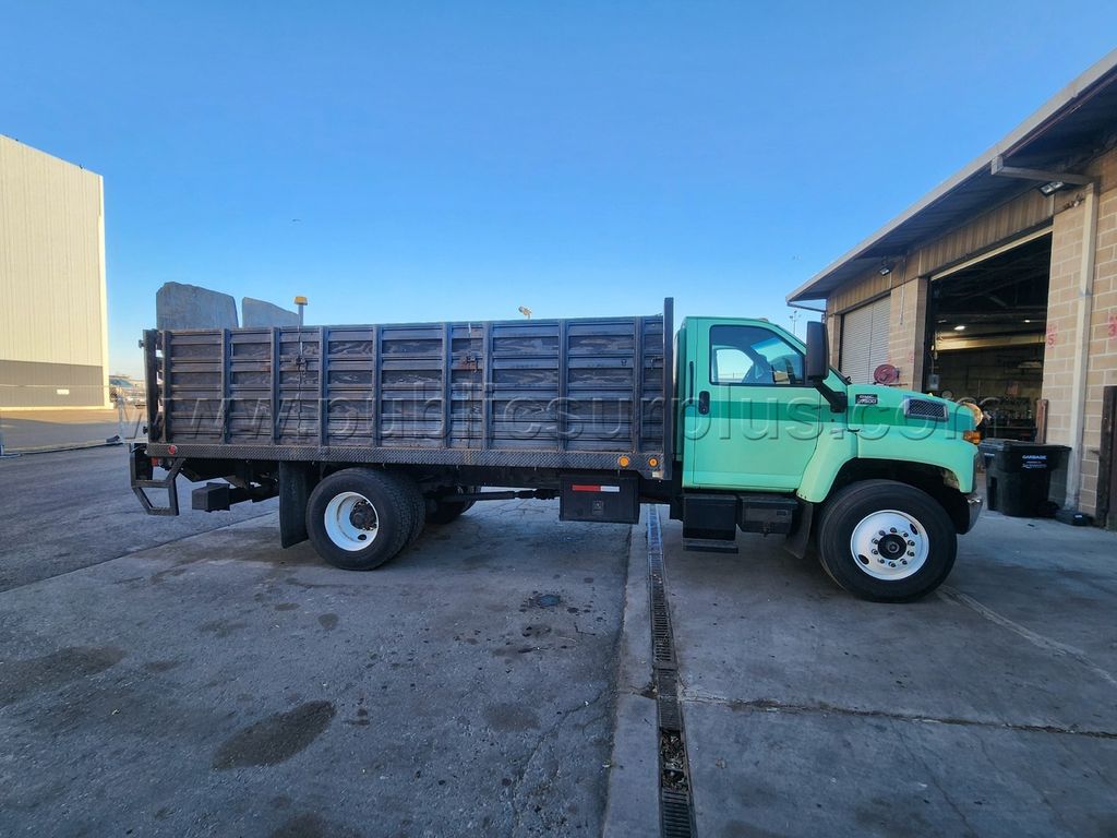 2009 GMC C7500 Stake Bed Dump - photo 1